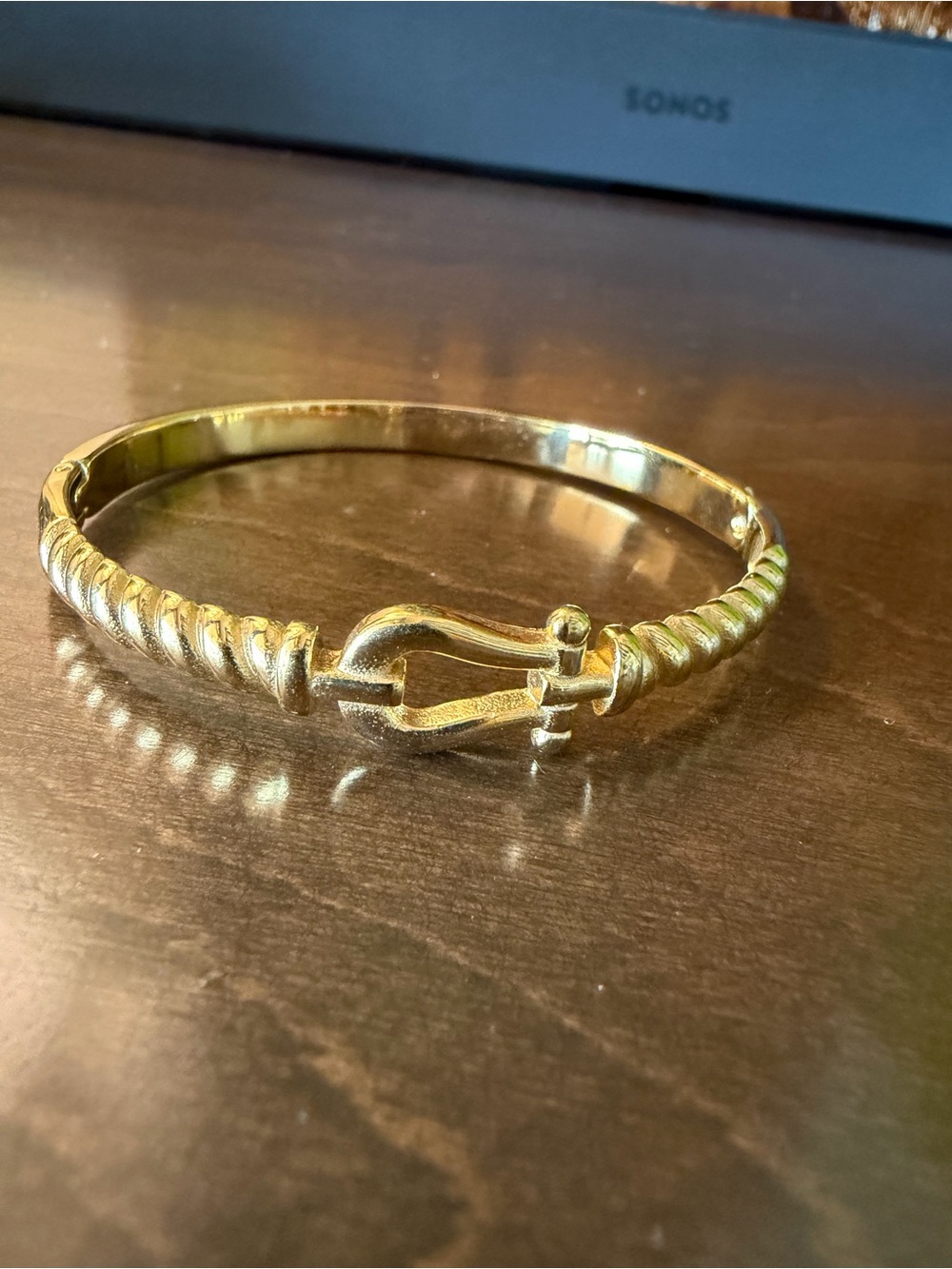 Gold Tone Hinged Horseshoe Buckle Rope Twist Bangle Bracelet